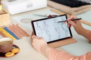 fashion-designer-drawing-sketch-BF5L95D